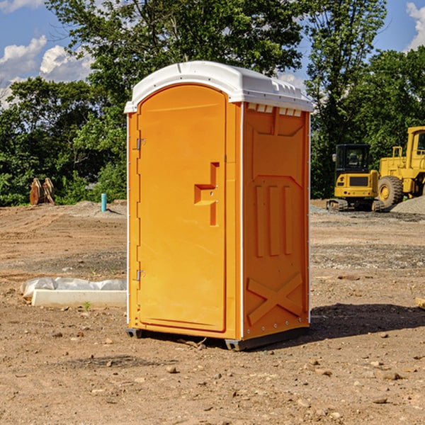 how often are the porta potties cleaned and serviced during a rental period in Lely